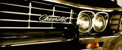 A Close Up Of A Chevrolet Car 'S Grill GIF