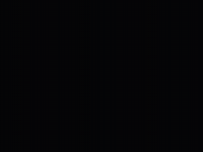 a close up of a circular object in the dark