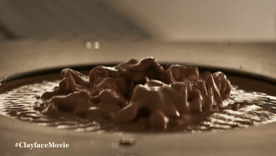 A Close Up Of A Clayface Movie Advertisement GIF