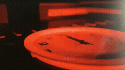 A Close Up Of A Clock With The Hands On The Numbers 10 And 11 GIF