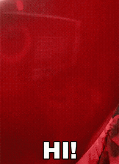 A Close Up Of A Clown With A Red Balloon And The Words Hi ! GIF