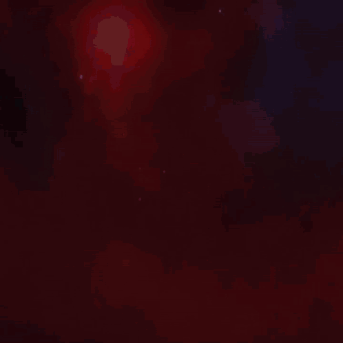 A Close Up Of A Colorful Dragon 'S Head With A Red Background GIF