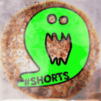 A Close Up Of A Cookie That Says Shorts GIF