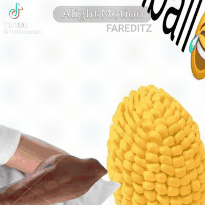 a close up of a corn on the cob with a person 's ear on it .