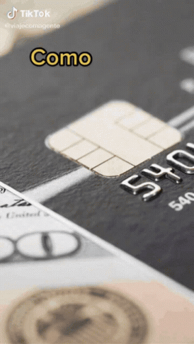 A Close Up Of A Credit Card With The Words Como On It GIF