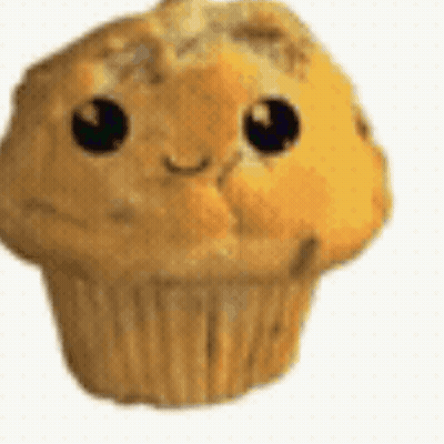 A Close Up Of A Cupcake With A Face On It On A White Background . GIF