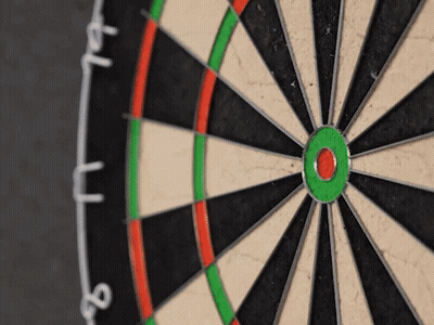 A Close Up Of A Dart Board With The Number 8 Written On It GIF