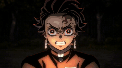 A Close Up Of A Demon Slayer Character With A Fire Coming Out Of His Mouth GIF