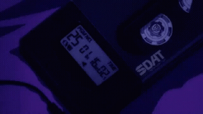 A Close Up Of A Device With A Purple Background And A Purple Screen . GIF