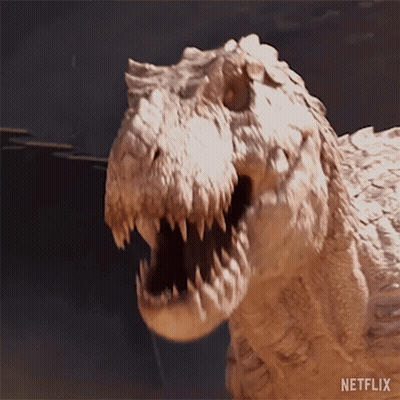 A Close Up Of A Dinosaur With Its Mouth Open And The Word Netflix On The Bottom Right GIF