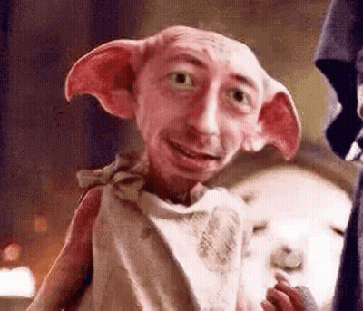 A Close Up Of A Dobby From Harry Potter With Big Ears . GIF