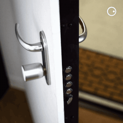 A Close Up Of A Door With A Handle GIF