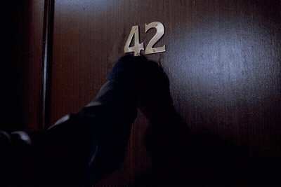 A Close Up Of A Door With The Number 12 Visible GIF