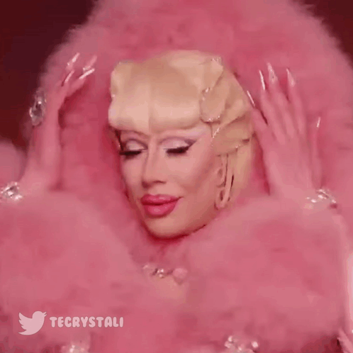 Close Up Of Drag Queen's Face With Twitter Icon GIF