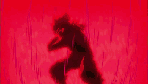 A Close Up Of A Dragon Ball Z Character With A Fist In The Air GIF