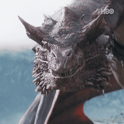 A Close Up Of A Dragon 'S Face With The Hbo Logo Visible GIF