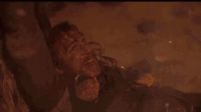 A Close Up Of A Dragon 'S Wings Flying In The Air . GIF