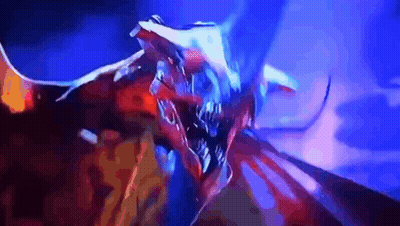A Close Up Of A Dragon With A Blue Background GIF
