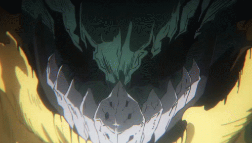 A Close Up Of A Drawing Of A Monster 'S Face With Sharp Teeth GIF