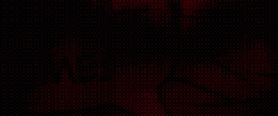 A Close Up Of A Drawing Of A Person 'S Face With A Red Background GIF