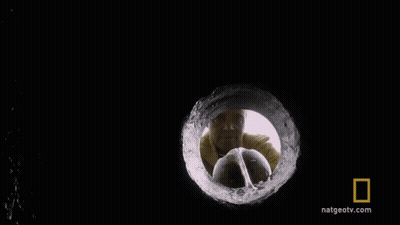 A Close Up Of A Drop Of Water With The National Geographic Logo On The Bottom GIF