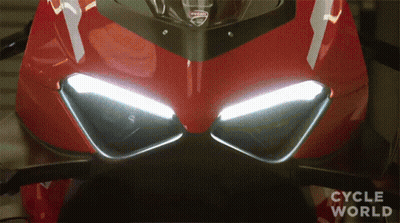 A Close Up Of A Ducati Motorcycle 'S Headlights GIF