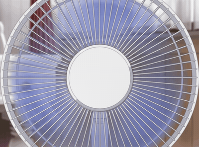 a close up of a fan with a white circle in the center
