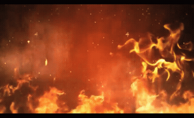 A Close Up Of A Fire With Sparks Flying In The Air On A Black Background . GIF