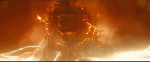 A Close Up Of A Fireball With A Lot Of Flames Coming Out Of It GIF
