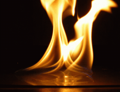 A Close Up Of A Flame With The Letter M Visible GIF