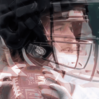 A Close Up Of A Football Player Wearing A Helmet That Says Nfl GIF