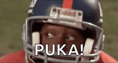 A Close Up Of A Football Player Wearing A Helmet With The Word Puka Written On It . GIF