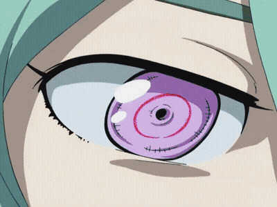 A Close Up Of A Girl 'S Eye With A Purple Circle In The Middle GIF