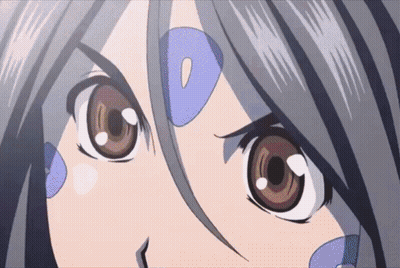 A Close Up Of A Girl 'S Eyes With A Blue Circle Around Her Eye GIF