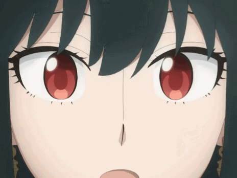 A Close Up Of A Girl 'S Eyes With Red And White Irises GIF