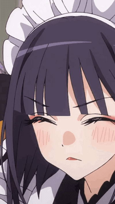 A Close Up Of A Girl 'S Face Wearing A Maid Costume GIF