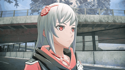 A Close Up Of A Girl 'S Face With A Fence In The Background GIF