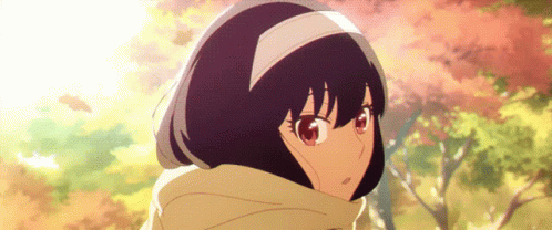 A Close Up Of A Girl 'S Face With A Hood On Her Head GIF