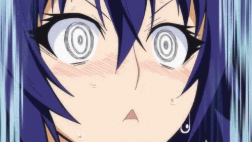 A Close Up Of A Girl 'S Face With A Hypnotic Look On Her Eyes . GIF