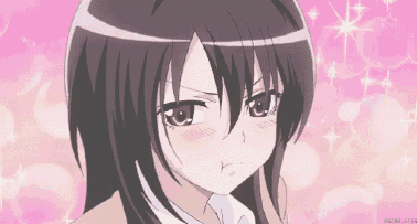 A Close Up Of A Girl 'S Face With A Pink Background Behind Her . GIF