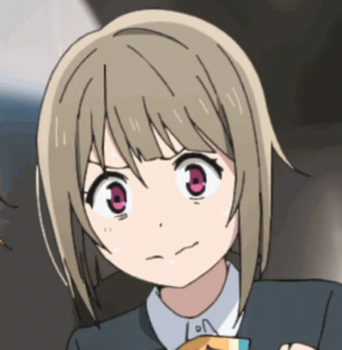 A Close Up Of A Girl 'S Face With A Pink Eye GIF