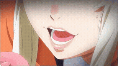 A Close Up Of A Girl 'S Face With A Pink Tongue Sticking Out GIF