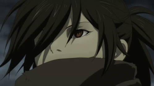 A Close Up Of A Girl 'S Face With A Scarf Around Her Neck GIF
