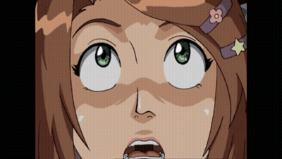A Close Up Of A Girl 'S Face With A Surprised Look On Her Face GIF