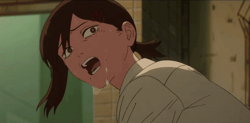 A Close Up Of A Girl 'S Face With A Tear Coming Out Of Her Mouth GIF