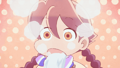 A Close Up Of A Girl 'S Face With Bubbles Coming Out Of Her Mouth GIF