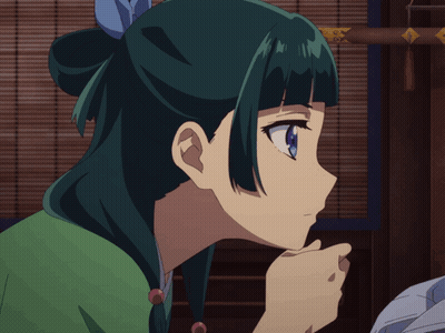 A Close Up Of A Girl 'S Face With Green Hair GIF