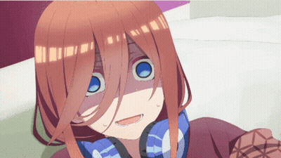 A Close Up Of A Girl 'S Face With Headphones On GIF