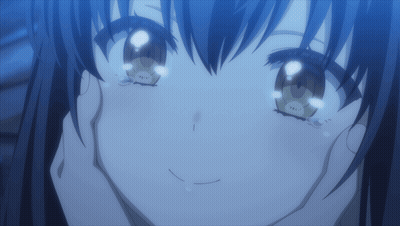 A Close Up Of A Girl 'S Face With Her Eyes Closed GIF