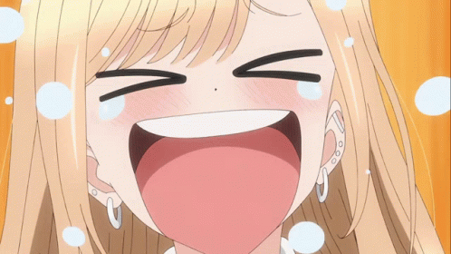 A Close Up Of A Girl 'S Face With Her Mouth Open And Tears Coming Out Of Her Eyes GIF